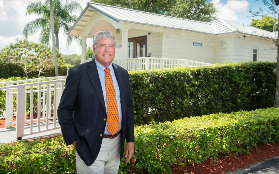 Mr. David Faus stands in front of his office after joining Benjamin as the new head of school.