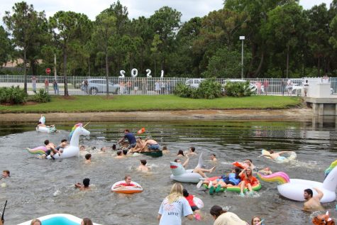 The majority of the Class of 2021 braved the fishy waters of the lake to mark their last day of classes. As is tradition, many chose to bring along inflatables for their float across the pond. 