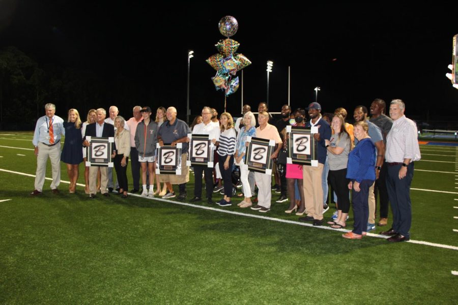 This year’s Hall of Fame Inductees, with their families and friends, joined School
administrators on Theofilos Field following the ceremony.