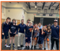 The JV Wrestling team gathers for a picture at the Jensen Beach
Tournament.