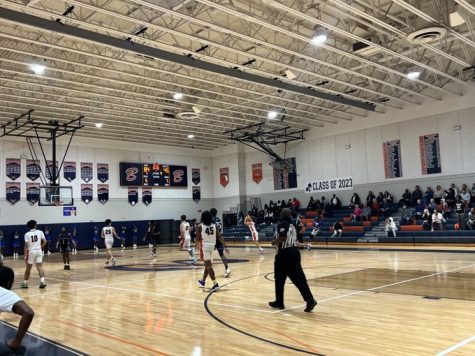 Fans filled the bleachers during the Buc’s opening round match up against Inlet Grove on Feb. 10. The boys’ varsity squad won the game handily, though are not easing up on their preparation for their upcoming games as they look towards a long post-season. 