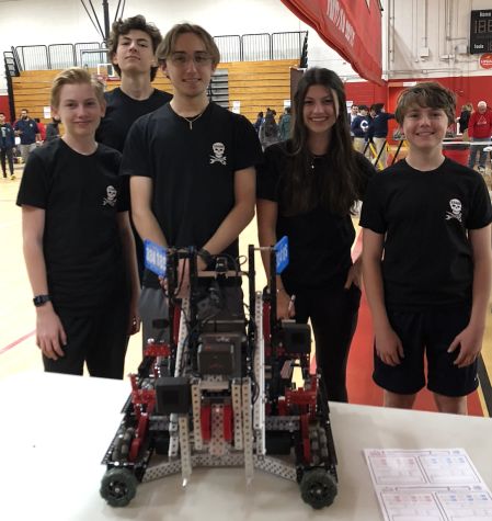 The Benjineers VEX Robotics team consists of freshman Ollie Olsson-White, junior Jack Hilzenrath, senior Ryan Riutta,
freshman Kate Hilzenrath, and freshman John Lacy. This successful team won the State Championship, and is on their way
to the World Championship, where they will compete with 4284 other teams.