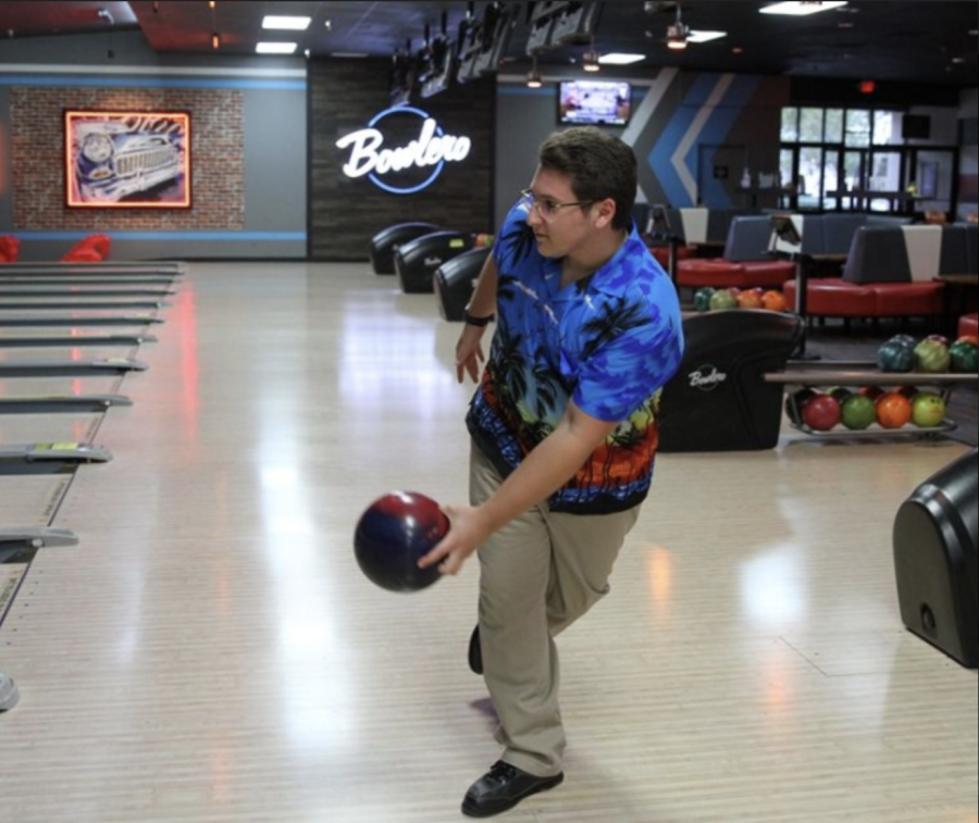 Senior Gerald Bissell bowls during one of the Bucs’ matchups. Bissell served as captain of the bowling team this season.