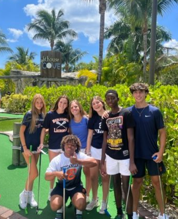 Freshmen Addy Walczak, Piper Tuohey, Chase Zur, Annabel Bridger, Kaden Faniel, Jake Ivancevic, Terrion Ivy-Atkins take a break from putting during the 9th Grade excursion to Jupiters Lighthouse Cove mini-golf.