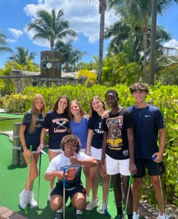 Freshmen Addy Walczak, Piper Tuohey, Chase Zur, Annabel Bridger, Kaden Faniel, Jake Ivancevic, Terrion Ivy-Atkins take a break from putting during the 9th Grade excursion to Jupiter's Lighthouse Cove mini-golf.