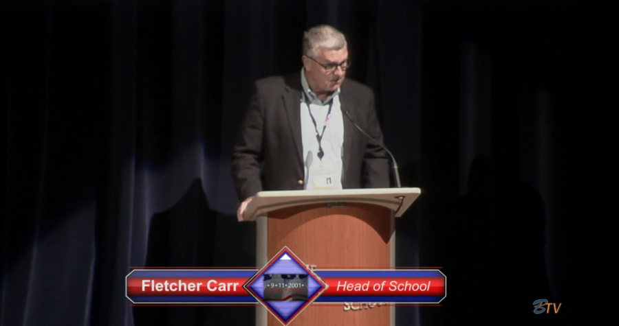 Head+of+the+Upper+School+Mr.+Fletcher+Carr+addresses+students+at+the+start+of+the+annual+9%2F11+assembly.