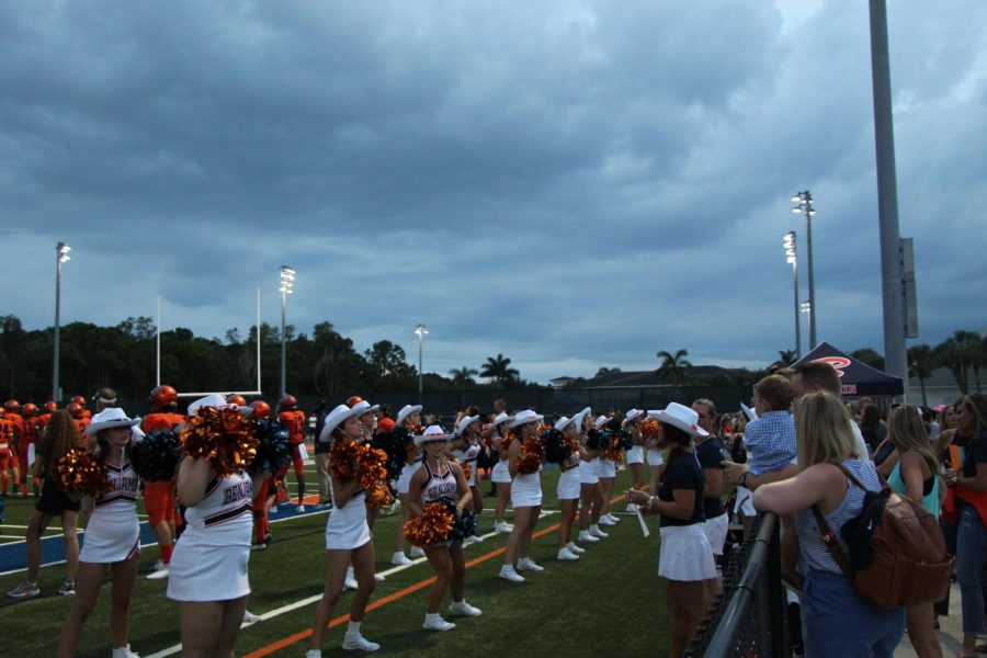 The+cheerleaders+play+a+huge+role+in+Benjamins+sporting+events.+At+the+Cardinal+Newman+game%2C+their+performance+was+even+more+important+because+of+the+long-lasting+rivalry+between+the+Buccaneers+and+the+Crusaders.+