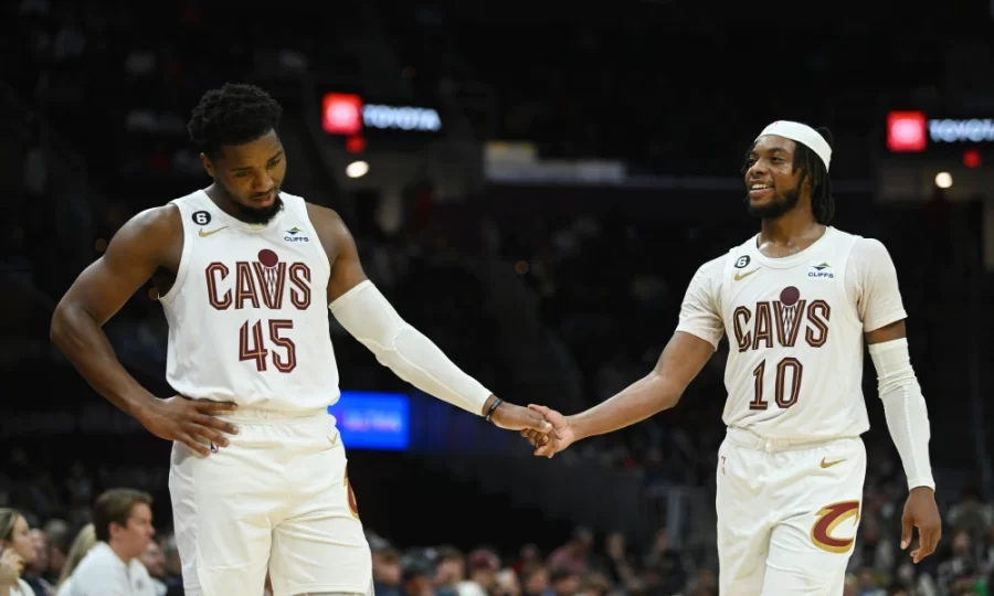 Cleveland+Cavaliers+guards+Darius+Garland+and+newly+traded+Donovan+Mitchell+congratulate+each+other+during+a+preseason+game.++