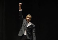 Ishe Makoni (26) raises his hand in triumph following a compelling interpretation of Elton Johns anthemic Im Still Standing. Makonis number was a highlight of the annual Freshmen Got Talent show held during PSAT day.