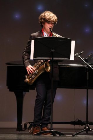 Class of 26, RJ Pierman plays the saxophone in the underclassmen solo ensemble.