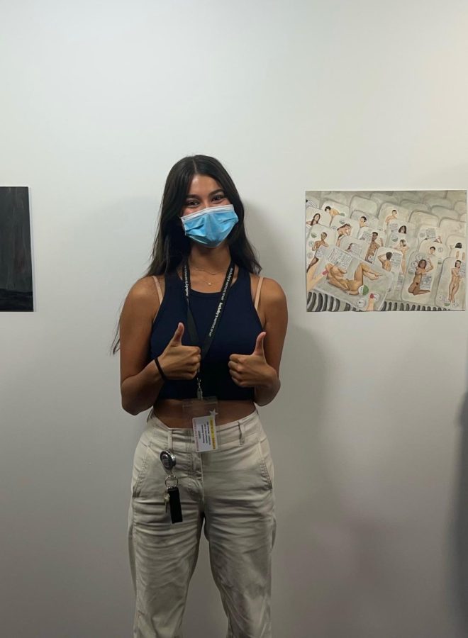 Barakett is standing next to a piece she created at a Sotheby's Summer program in 2022. (Photo courtesy of Maddy Barakett)