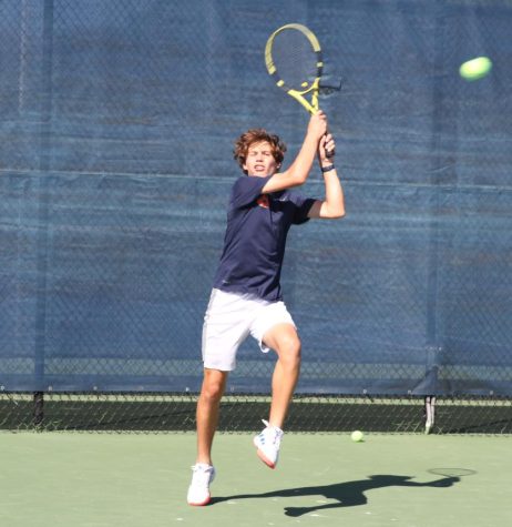 Seventh-grader Misha Liberzon hits a backhand versus Jacob Hartman, where Liberzon lost 4-8. “I played well, but Jacob played better. I know him personally, and the last time I played him it was closer than 4-8. He played the better match today, and he deserved it with all of the work he put on the court,” Liberzon said. 
