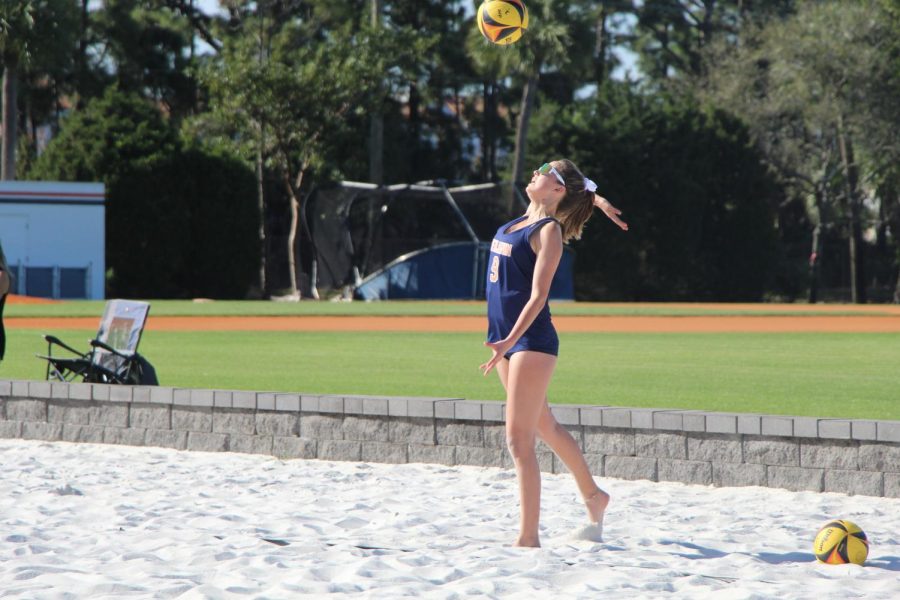 Junior+Maggie+Smith+serves+to+the+opposing+Tigers+in+the+first+set+during+the+beach+volleyballs+preseason+game.+She+and+sophomore+Leanna+Spada+would+dominate+the+first+set+21-5+and+ultimately+win+in+three+sets.