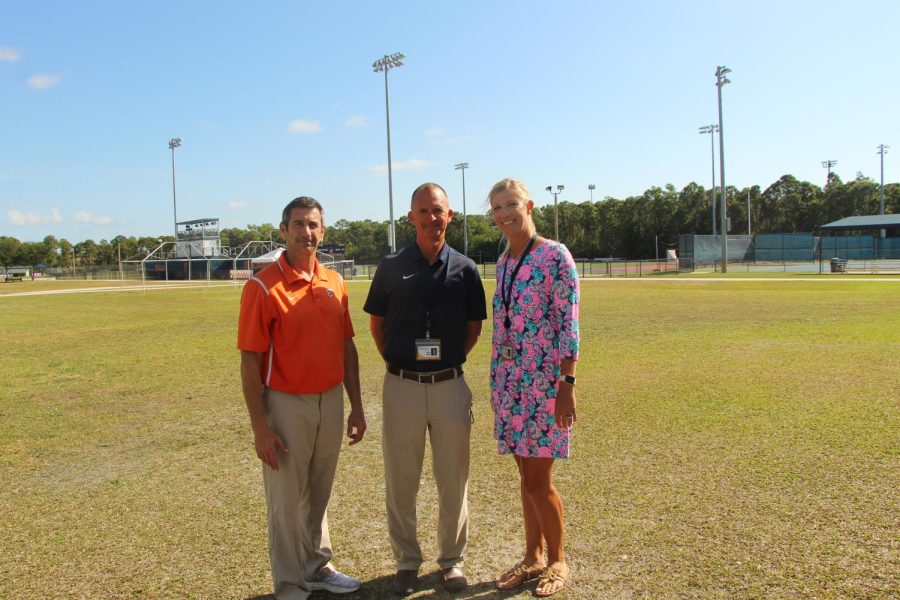 The three ADA pose in front of the various Benjamin Upper School Athletic fields. (Photo Courtesy of Dev Maharaj)