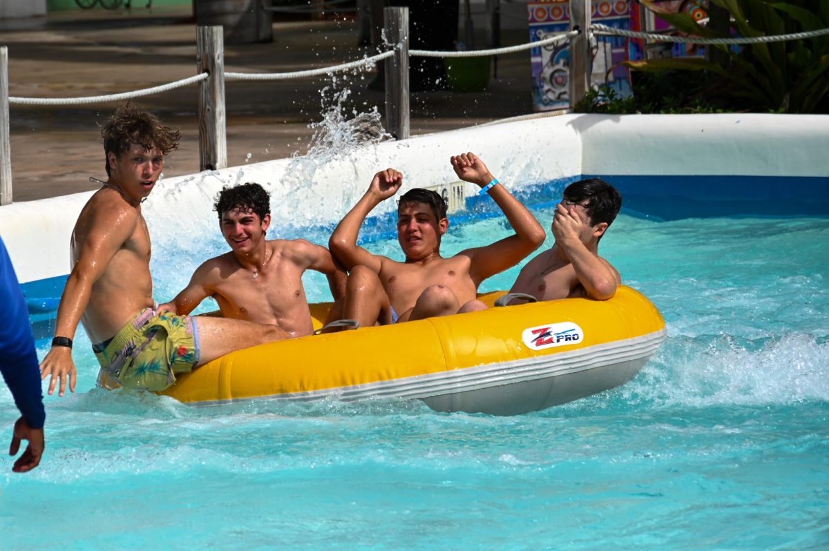 Seniors (from left to right) Tyler Bruneau, Luke Wise, Travis Robertson, and Ryan Fitzpatrick brace for impact as they splash into the water.