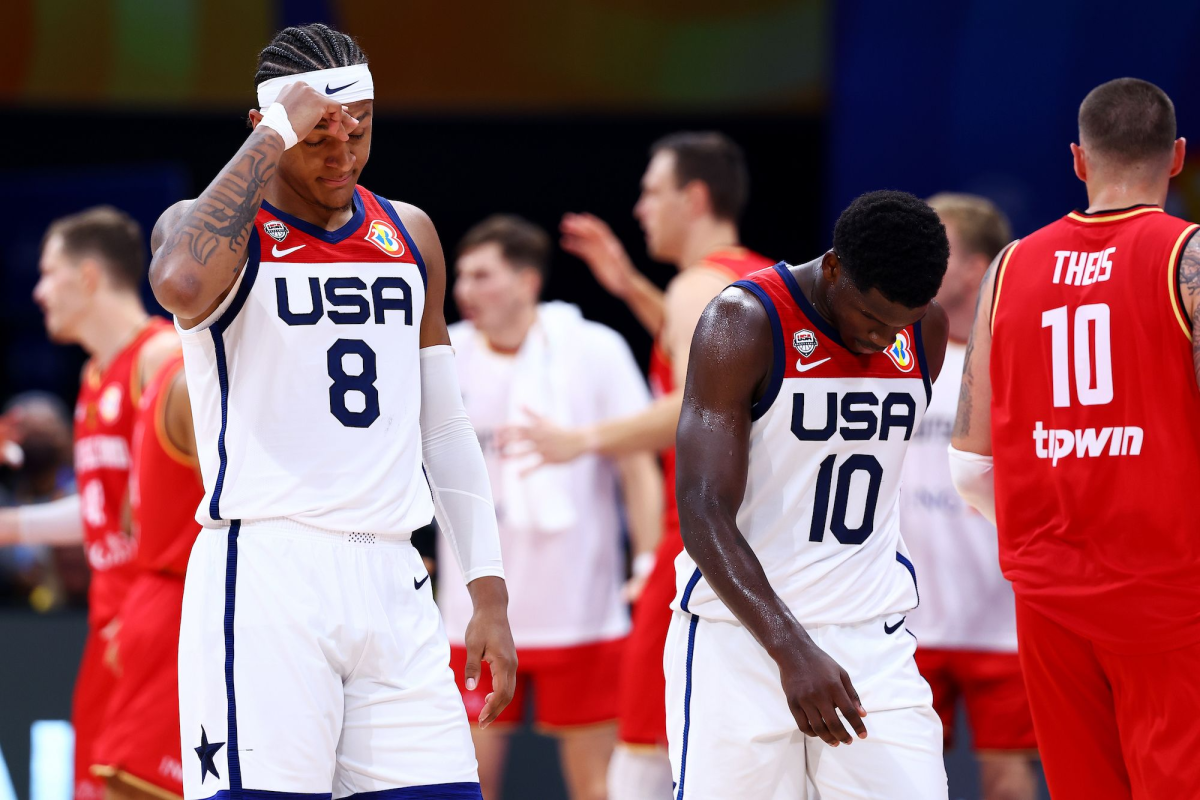 Team USA’s Paolo Banchero (left) and Anthony Edwards (right) walk off the court in disbelief as the United States falls to Germany in the FIBA World Cup Semifinals.