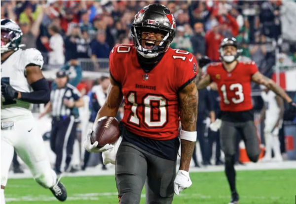 Buccaneers wide receiver Trey Palmer celebrates after scoring the dagger in the last game of the Super Wild Card Weekend versus the Eagles. This 56-yard-touchdown sealed the game with a winning score for the Bucs 32-9.