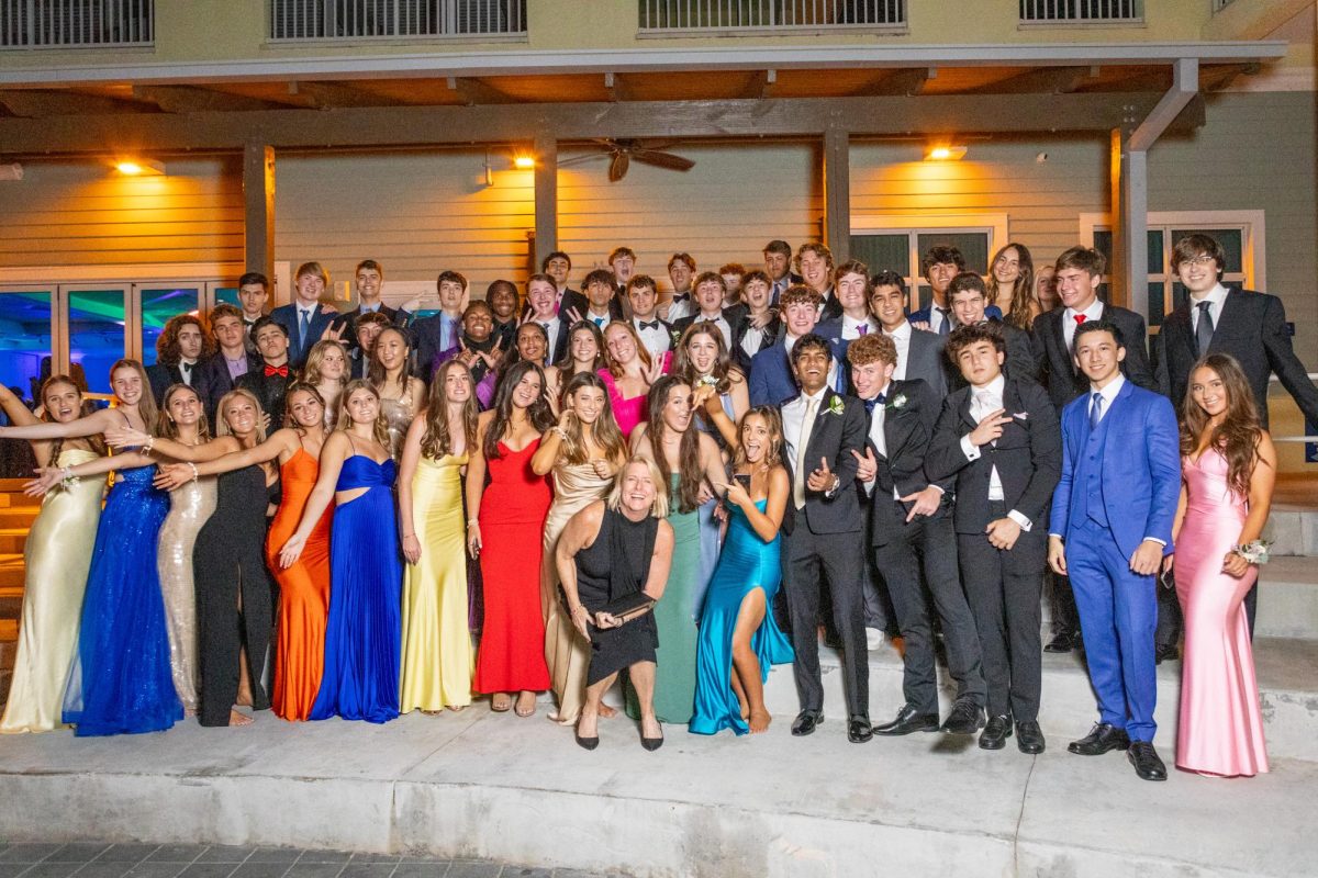 All of the seniors pose for a picture at prom.