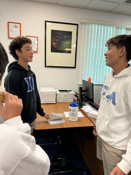 Freshmen Ducky Little (left) and Taylor McCorkle sport Duke and UCLA sweatshirts