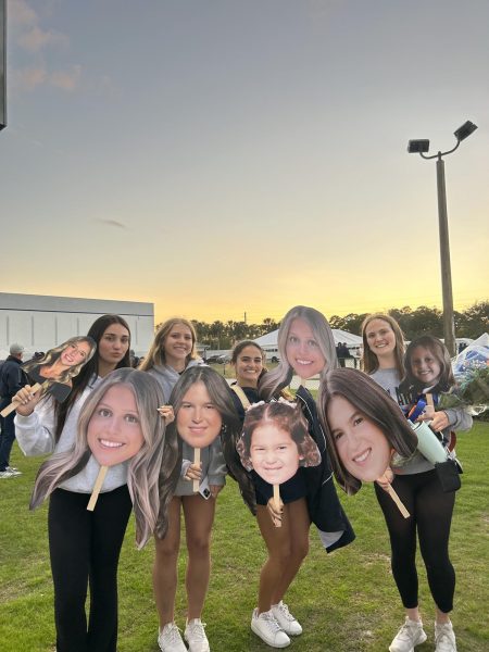 Friends of the senior girls brought pictures of them to show off their pride and happiness to celebrate.