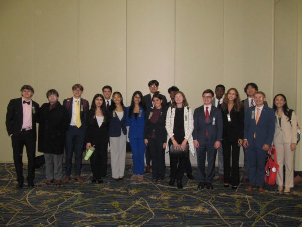 Fourth from the right, Finley Strauss stands beside the other competitors in from her category