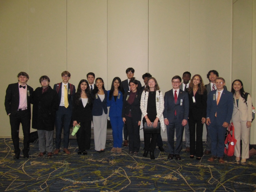 Fourth from the right, Finley Strauss stands beside the other competitors in from her category