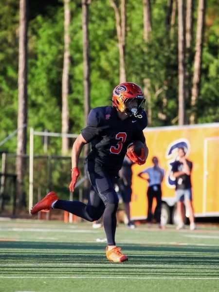 Junior Nick Skillin trots into the endzone in the second quarter. "I love this team and I love the way we play football. I know we will continue this throughout the season," Skillin noted. 