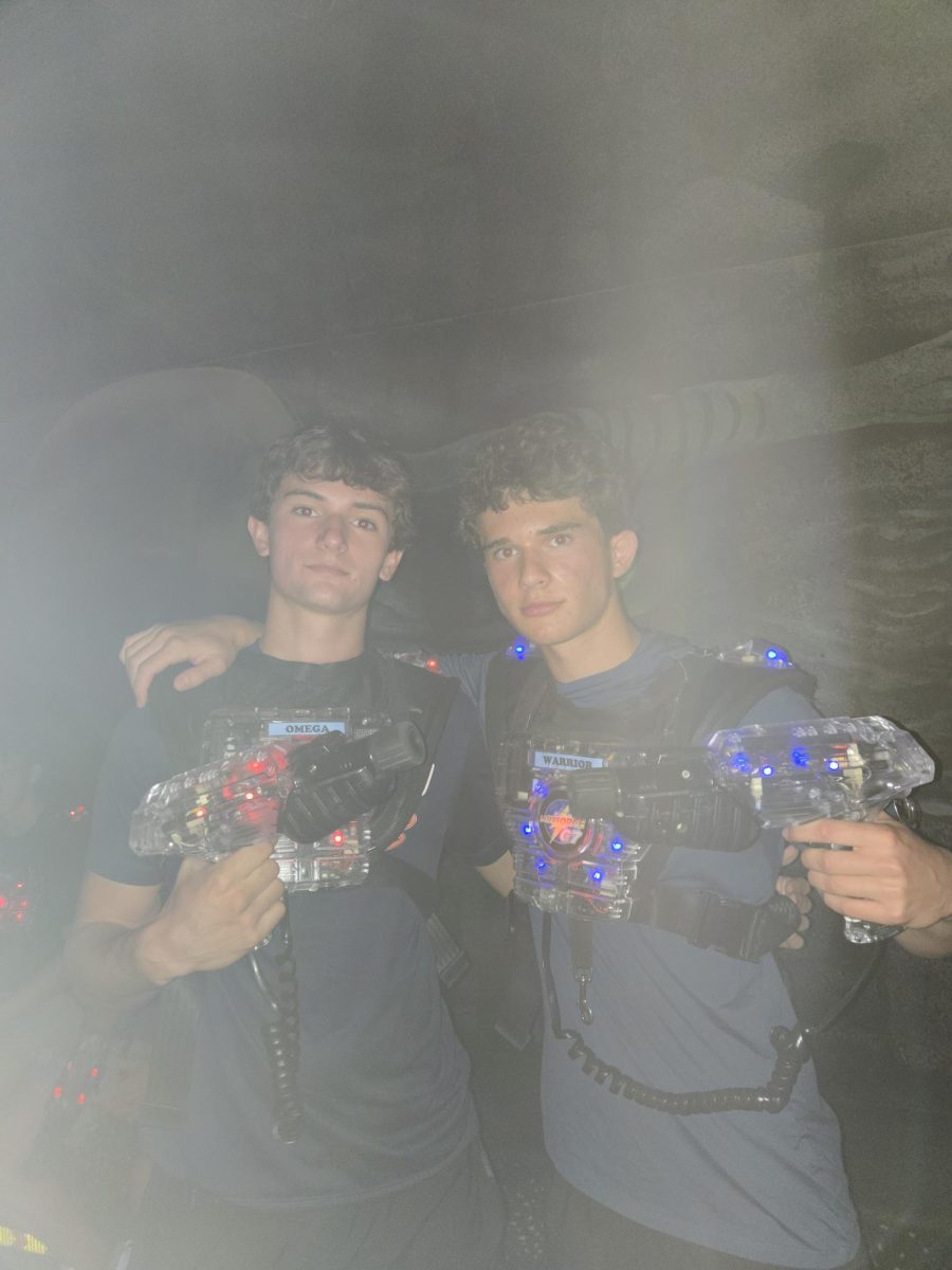 Juniors Brandon Owens (left) and Daniel Reznik (right) get together for a picture while in the middle of a game. 