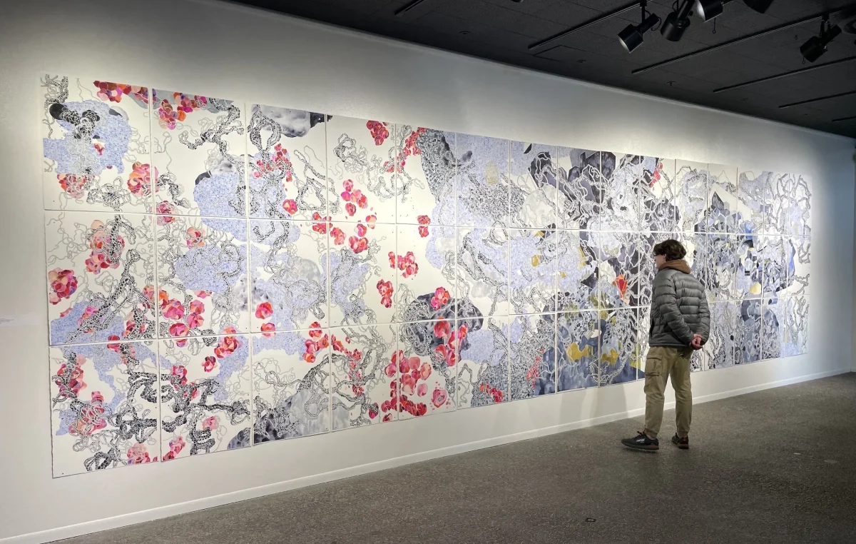 Pictured above is Ms. Kroul's piece, Even Now. This piece is one of many that focuses on how memory shapes identity. 