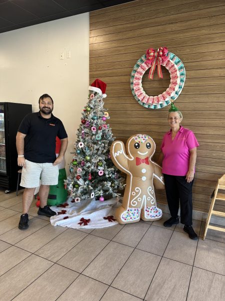 Mr. Rubiano stands at a Dunkin' Donuts in Royal Palm Beach with his mother, Sue
