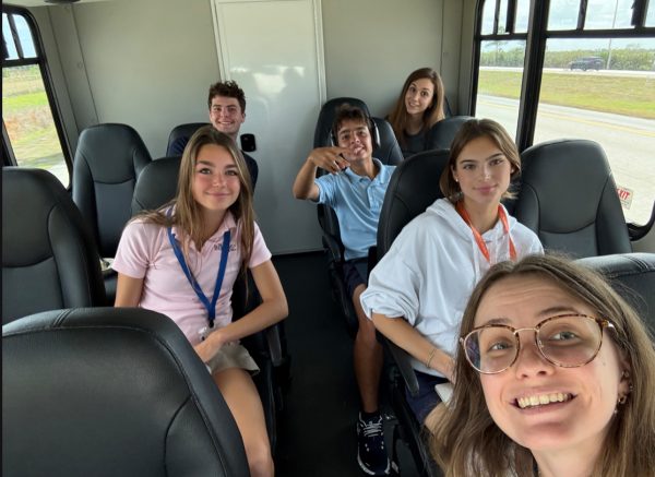 Members of the Debate Team pose for a photo on the way to the Forensic League State Championship